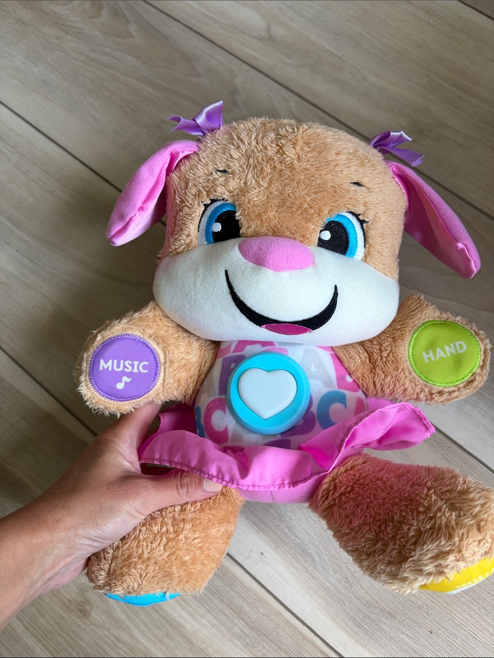 Fisher-Price Interactive Pink Plush Puppy with Music and Hand Buttons
